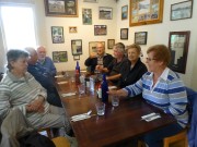 31 - Pat H, Ken J, Gerry H, Ray W, Rex & Lyn M, Gerda W waiting for lunch