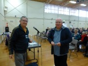 Rex Markby presents Howard Davis with his name badge